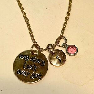 Gold Tone “my story isn’t over yet” suicide awareness chain dangle necklace
